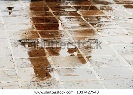 reflection  on wet floor 