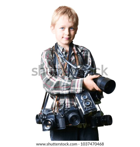Child boy photographer with many cameras around his neck. Photographer enthusiast. Isolated on white background
