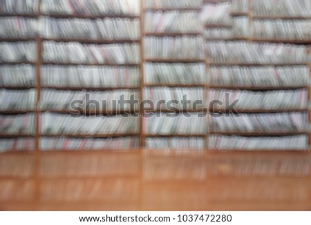 Full library book shelfs bokeh background