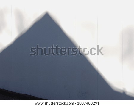  The shadow of the city in the panel fence         