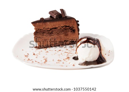 Chocolate cake and ice cream whith chocolate sauce on plate, isolated.
