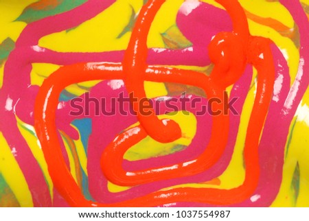psychedelic multicolored background of a mixture of paints