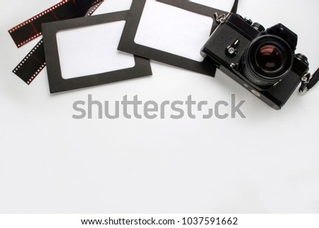Photo frame with camera on white background. Photo frame to insert an image.
