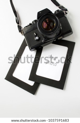 Photo frame with camera on white background. Photo frame to insert image.