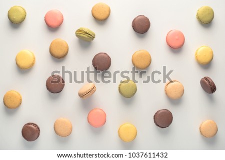 top view of colorful macarons cookies like background, dessert concept