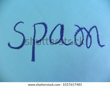 Text spam hand written by dark blue oil pastel on blue color paper