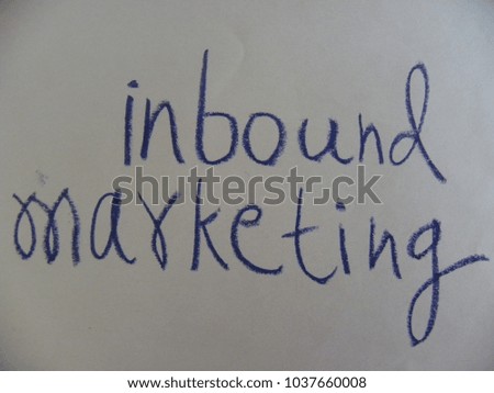 Text inbound marketing hand written by dark blue oil pastel on white color paper