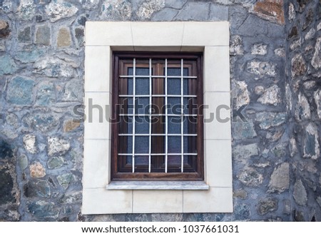 window with metal lattice (bars) as a texture