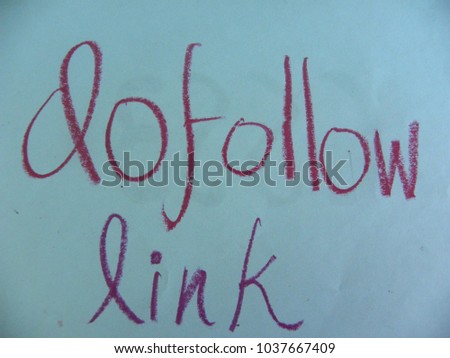 Text dofollow link hand written by purple oil pastel on blue color paper