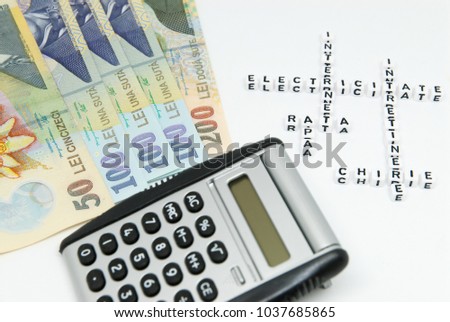 romanian currency leu ron and calculator and words written in romanian representing household monthly expenses concept photo