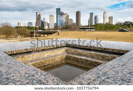 Reflecting Pool in Park, Highway, and Downtown Houston in Background - Houston, Texas, USA