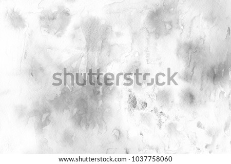 Silver watercolor ombre leaks and splashes texture on white watercolor paper background. Natural organic shapes and design.