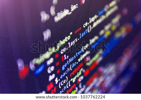 Website HTML Code on the Laptop Display Closeup Photo. Software engineer at work. Mobile app developer. Creative focus effect. Website programming code. Abstract technology background. 