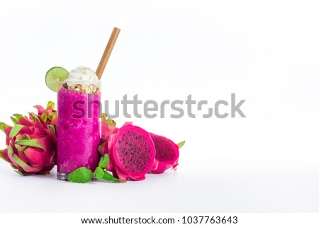 A dragon fruit smoothie with muesli mint and whipped cream to top it off. Royalty-Free Stock Photo #1037763643