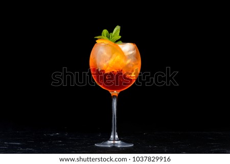 alcoholic beverage on a black background