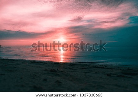 Beautiful dramatic Sunset at Maldives beach resort for holiday background