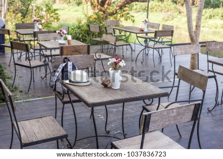 Empty cafe table with chair in vintge coffee shop, Food and drink decoration