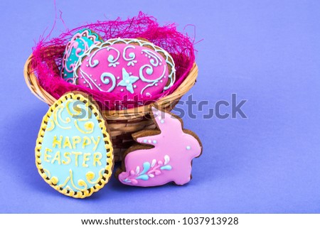 Easter eggs formed as tasty homemade cookies on bright background. Studio Photo