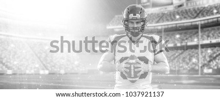 American Football Player isolated on big modern stadium field with lights and flares