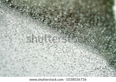 Snow and ice on a glass background - Oxford - UK