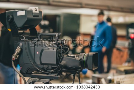 Behind the scene. Film camera in film studio
