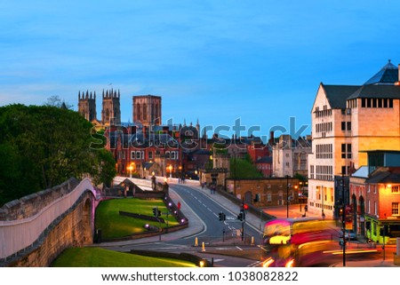 York, UK. Sundown of central York, UK, with York Minster cathedral on the back and blue cloudy sky.