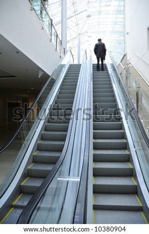 moving escalator in the office hall