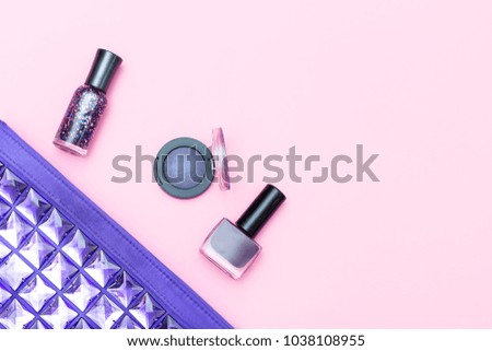 Cosmetics and accessories on a pink background