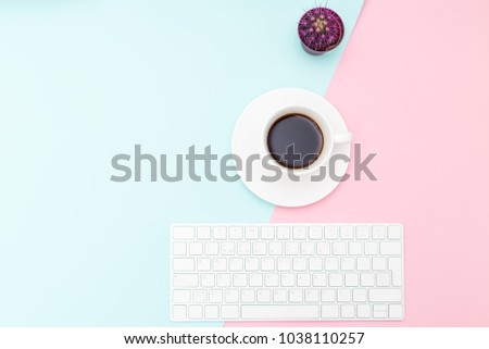 Desk and stationery pastel colored. Flat lay
