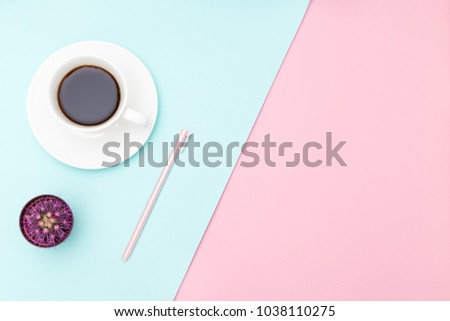 Desk and stationery pastel colored. Flat lay