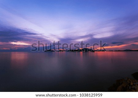 Long exposure image of dramatic sunset or sunrise,sky clouds over tropical sea