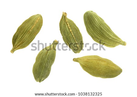 Green cardamom seeds isolated on white background. Top view. lay flat Royalty-Free Stock Photo #1038132325