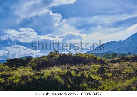 Fantastic view of Batur volcano on Bali island, Indonesia. Picturesque and gorgeous morning scene. Beauty world. Awesome valley in bright light. Picture of a wild area. Fantastic morning mountain.