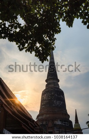 Old Temple and pagoda with evening background at Ayutthaya, Thailand