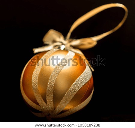 Golden print holiday ball - Christmas toy for the Christmas tree.
