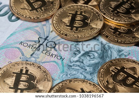 Bitcoin cryptocurrency coins with hundred czech crown bill