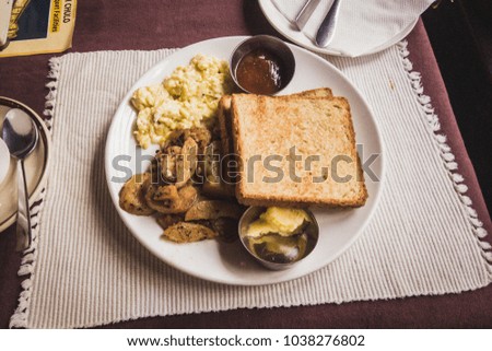 Color graded picture of a breakfast with toast, eggs and potatoes, Thamel, Kathmandu, Nepal