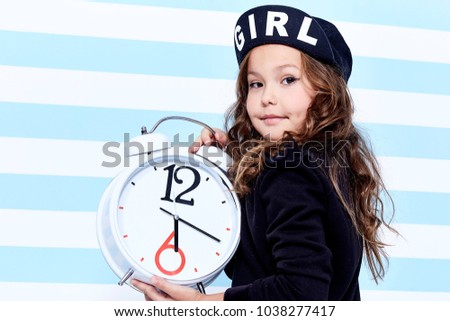School small baby girl dress for schoolgirl pupil uniform beret socks hat fun smile curly hair toy  studies learning fashion stile clothes child childhood little model cute face hold big watch play.