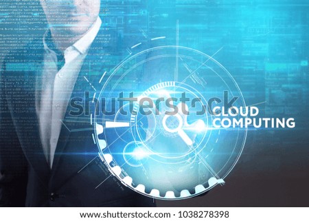 Business, Technology, Internet and network concept. Young businessman working on a virtual screen of the future and sees the inscription: Cloud computing