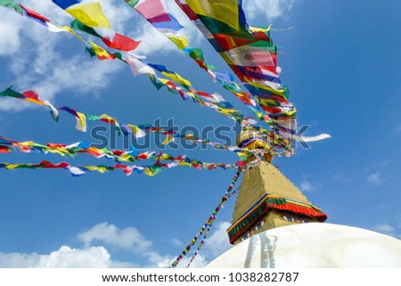 Scenic view of the dome of the Boudhanath Stupa, with prayer flags, Kathmandu, Nepal