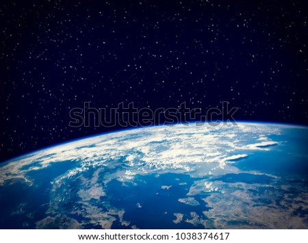 Earth and stars. The elements of this image furnished by NASA.