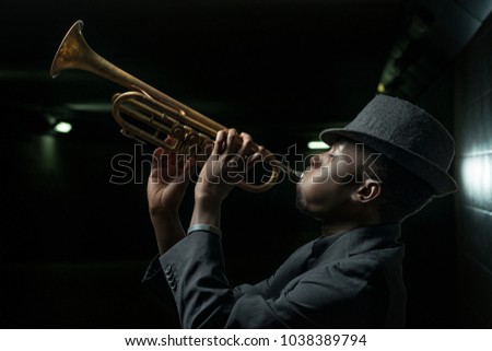 black musician with trumpet