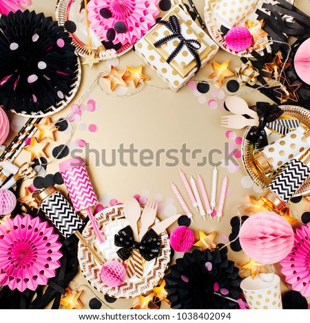 Birthday party background. Gold, black and pink color. Flat lay, top view