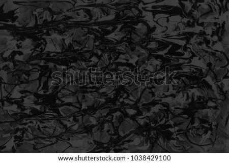 Dark black paint ombre leaks and splashes texture on white watercolor paper background. Natural organic shapes and design.
