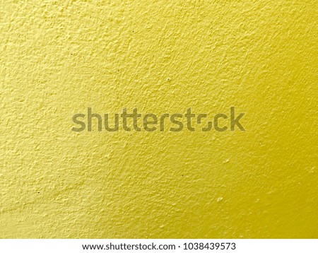 Old yellow concrete wall background and texture abstract