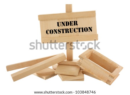 Under construction unfinished wooden house isolated on white