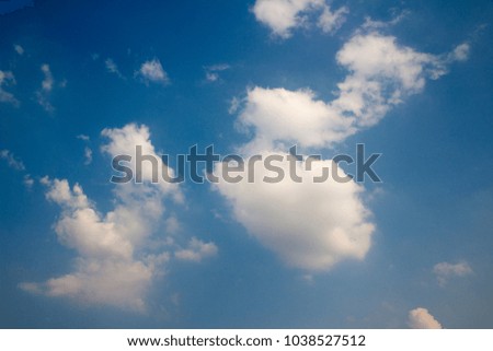 beautiful white clouds and clear blue sky in sunny day