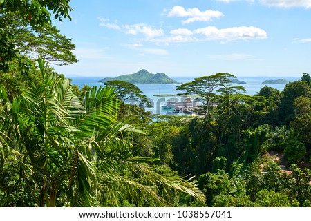 view of the coastline of the Seychelles Islands and Eden Island from Victoria viewpoint, Mahe       Royalty-Free Stock Photo #1038557041