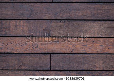 Abstract artistic background: an ordinary wooden wall.