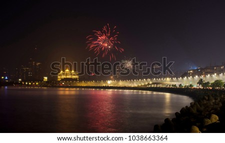 Diwali fireworks at Marine Drive.  Marine Drive is the most beautiful place at Mumbai, it's also known as Queen's Necklace.  Royalty-Free Stock Photo #1038663364